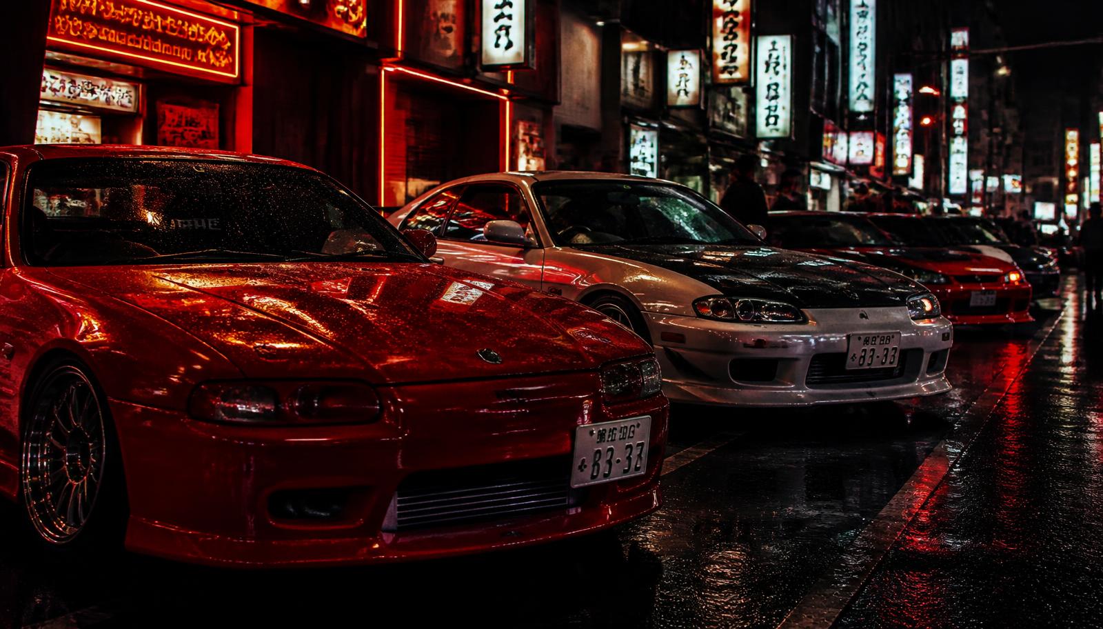 JDM cars lined up on a neon-lit Japanese street at night